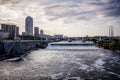 Sunset dusk view of Minneapolis Minnesota skyline as seen from the Mississippi River. Royalty Free Stock Photo