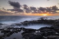 Sunset at El Bufadero natural blowhole on Gran Canaria. Ocean waves hiting rocks