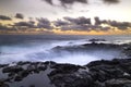 Sunset at El Bufadero natural blowhole on Gran Canaria. Ocean waves hiting rocks Royalty Free Stock Photo