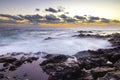 Sunset at El Bufadero natural blowhole on Gran Canaria. Ocean waves hiting rocks