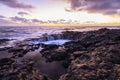 Sunset at El Bufadero natural blowhole on Gran Canaria. Ocean waves hiting rocks Royalty Free Stock Photo