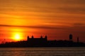 Sunset on Ellis Island in NYC bay