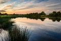 Sunset at Embleton Quarry Nature Reserve Pond Royalty Free Stock Photo