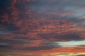 Sunset evening light blue sky with red pink purple clouds Royalty Free Stock Photo