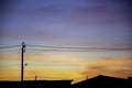 Beautiful light of Sunset with clouds in the sky reflection behind the building and paddy fields Royalty Free Stock Photo