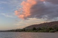 Sunset and evening mood on the Kunene River, Namibia Royalty Free Stock Photo