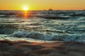 Sunset, evening, sea, waves, sand, travel, relaxation, ship Royalty Free Stock Photo