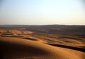 Sunset on the expanse of dunes in the Omani desert, Wahiba Sands / Sharqiya Sands, Oman Royalty Free Stock Photo