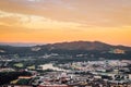 Sunset falls on city of Linz in northern Austria. Beautiful orange sky and the eastern part of city. Linzertorte is immersed in Royalty Free Stock Photo