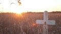 Sunset field cross remembrance rural memorial Royalty Free Stock Photo