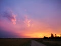 Sunset in fields of cut grain Royalty Free Stock Photo