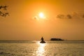 Sunset and fisherman silhouette