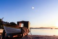 Sunset and fishing boat at the Abraao beach - Florianopolis - Brazil