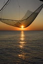 Sunset on fishing net carrelet