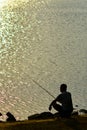 Sunset fishing silhouette Royalty Free Stock Photo