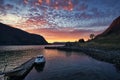 Sunset on the fjord of Selje Norway. very beautiful colors reflected in the clouds and the water Royalty Free Stock Photo