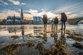 Sunset during flood of Danube river in winter 2021 in Regensburg with view of cathedral the old town and flooded promenade and the