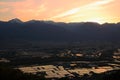 Sunset at flooded rice field