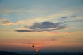 Sunset and flying balloon Royalty Free Stock Photo