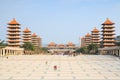 Sunset at Fo Guang Shan buddist temple of Kaohsiung, Taiwan with many tourists walking by. Royalty Free Stock Photo