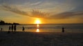 Sunset form the beach in Buzios. People enjoying the beach