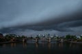 Sunset in Frankfurt am Main. Skyline wedged under a steel bridge. Right on the banks of the river Main and at the ECB in Frankfurt Royalty Free Stock Photo