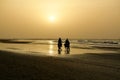 Sunset in Gambia couple on horseback