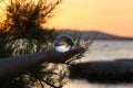 Sunset - Glass ball reflection of sea sunset