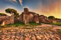 Sunset glimpse from cobblestones street in Ancient Ostia ruins