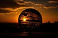 sunset, with the globe and its continents in silhouette Royalty Free Stock Photo