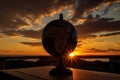 sunset, with the globe and its continents in silhouette Royalty Free Stock Photo