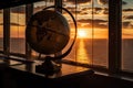 sunset, with the globe and its continents in silhouette Royalty Free Stock Photo