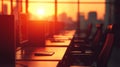 Sunset Glows Over Office Computers And Workstations Royalty Free Stock Photo