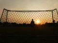 Sunset with goalkeeper Royalty Free Stock Photo