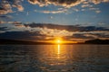 Sunset With God Rays Over Smooth Lake Powell Water During Golden Hour Royalty Free Stock Photo