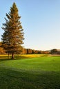 Sunset at the Golf Course - The sun sets on a putting green at the golf course in Autumn Royalty Free Stock Photo