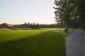 Sunset at the Golf Course - The sun sets on a putting green at the golf course in Autumn Royalty Free Stock Photo