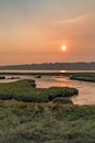 Sunset in grassland wetland along the sound Royalty Free Stock Photo
