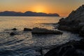 Sunset in the Gulf of Palermo viewed from a secluded beach near Bagheria