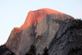 Sunset on Half Dome, Yosemite, view from Curry Village Parking Royalty Free Stock Photo