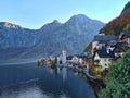 Sunset in Hallstatt mountain village with Hallstatter See in fall, Austria. Royalty Free Stock Photo