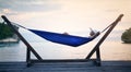 Sunset, hammock and woman on vacation, relax and view on weekend break, getaway and peace. Female person, girl and Royalty Free Stock Photo