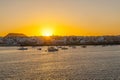 Sunset in the harbor with sailing Royalty Free Stock Photo