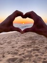 sunset in heart hands Royalty Free Stock Photo