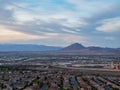 Sunset high angle view of the Frenchman Mountain and cityscape from Henderson View Pass