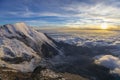 Sunset in the high mountains above the clouds Royalty Free Stock Photo