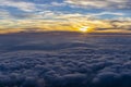 Sunset in the high mountains above the clouds Royalty Free Stock Photo