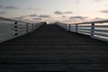 Sunset highlights on white rail  of Crystal Pier, San Diego Royalty Free Stock Photo