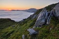 Sunset on hiking trail, above the clouds, on the Grotshornet mountain, Vatne, Norway 2017