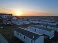 Sunset at holiday caravan site in Westward Ho! Devon UK